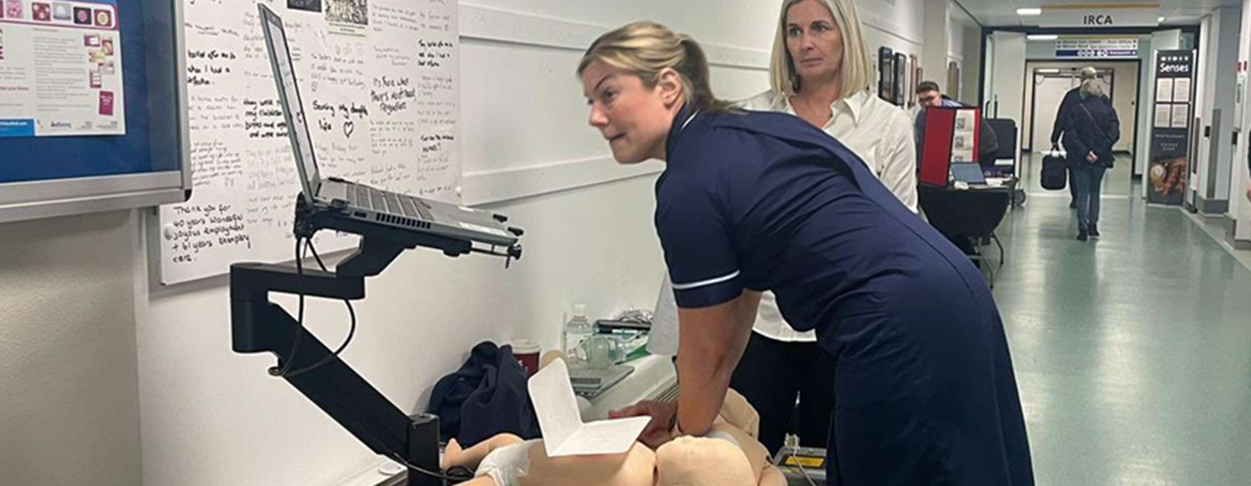 Medical staff performing CPR training.