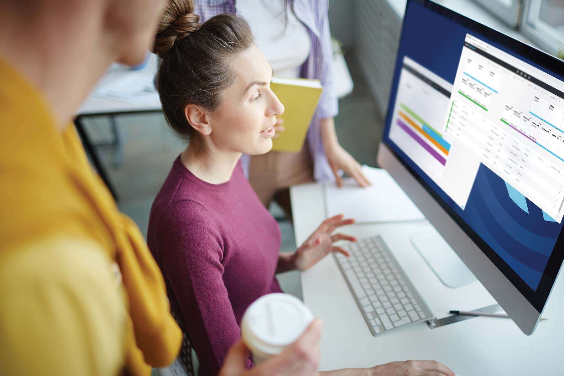 SimCapture center director collecting data on a computer