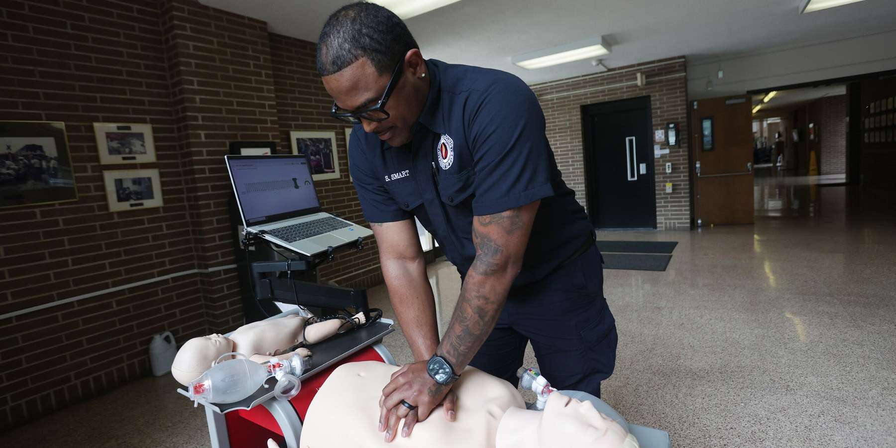 Firefighter using the Kelley cart for RQI training