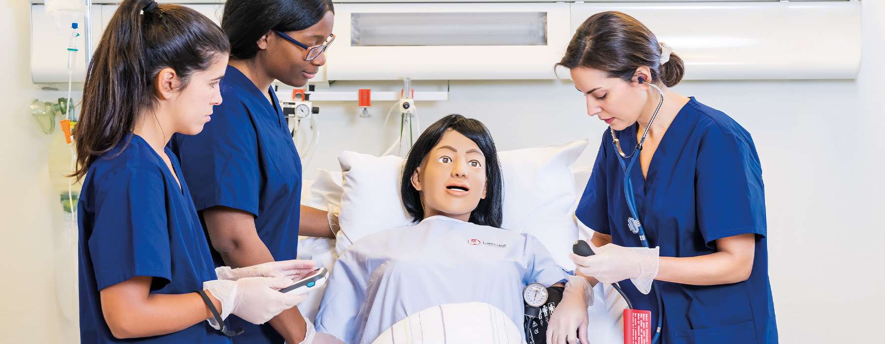 Team using MamaAnne in simulation training