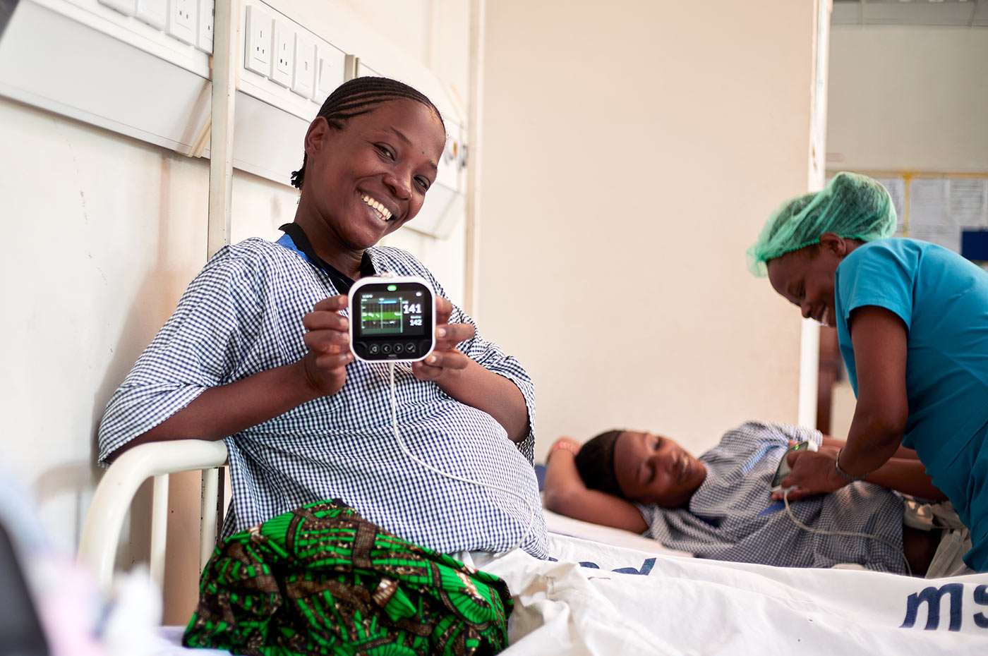 The Moyo 2 fetal heart rate monitor held by a patient