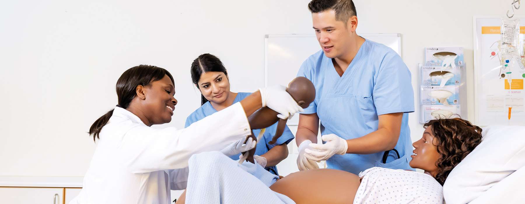 Group of nurses working on MamaAnne birth simulation