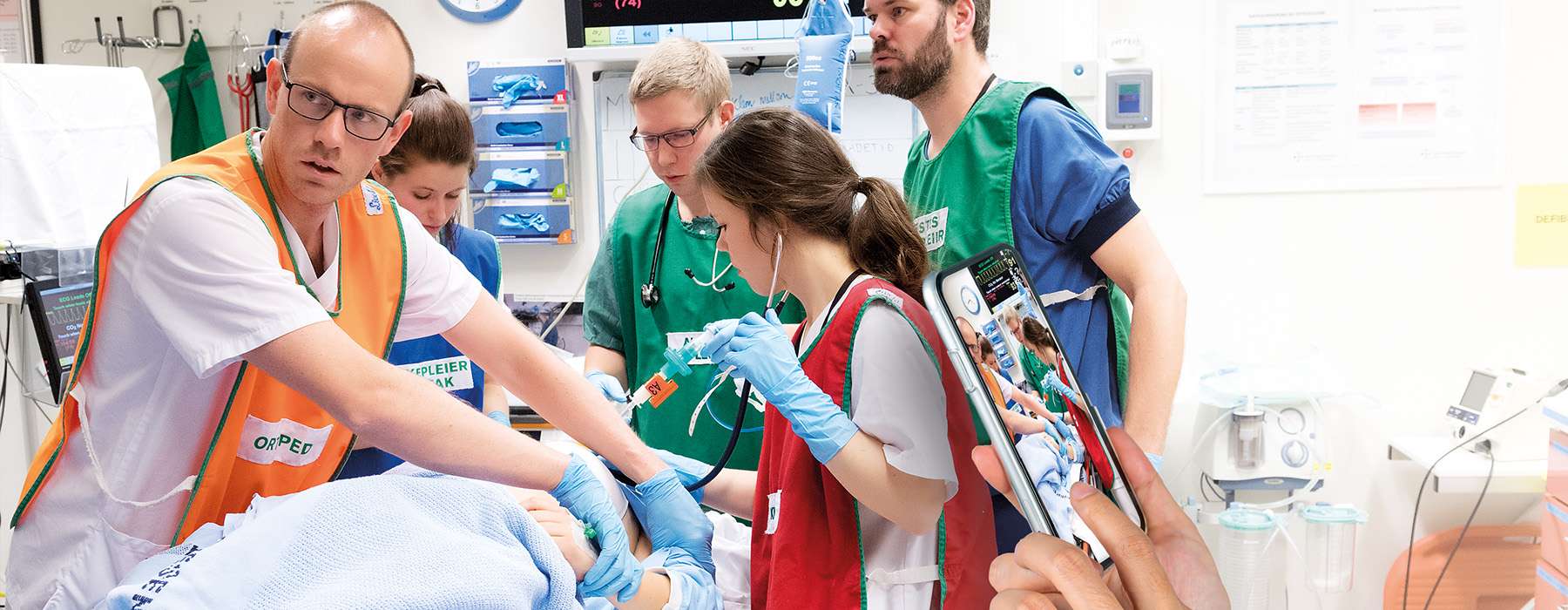 A team of EMS professionals in a training session.