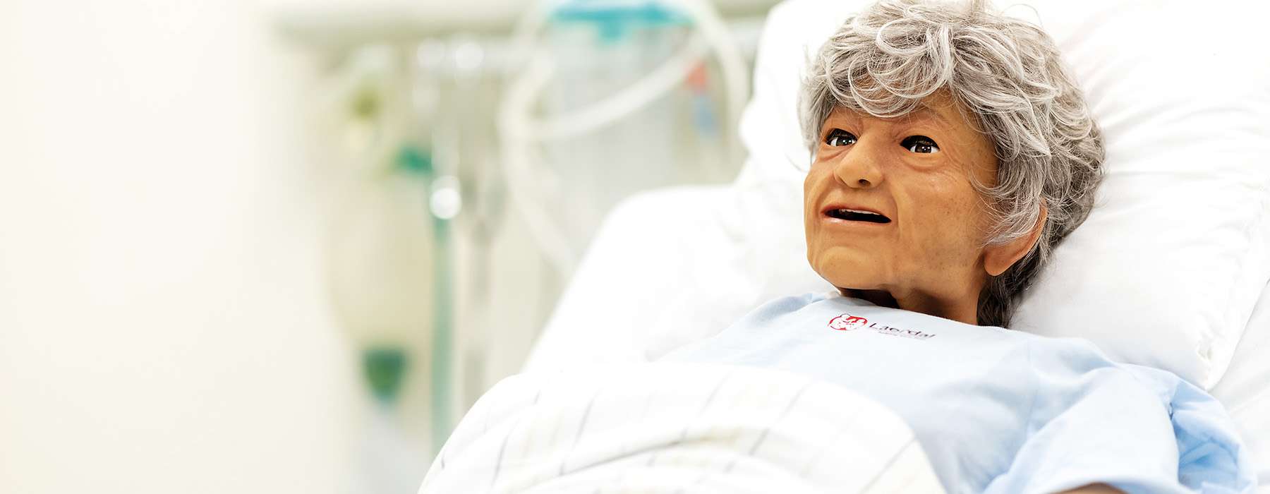 close-up of geriatric nursing anne on hospital bed.